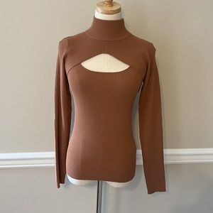 Brown cutout turtleneck top